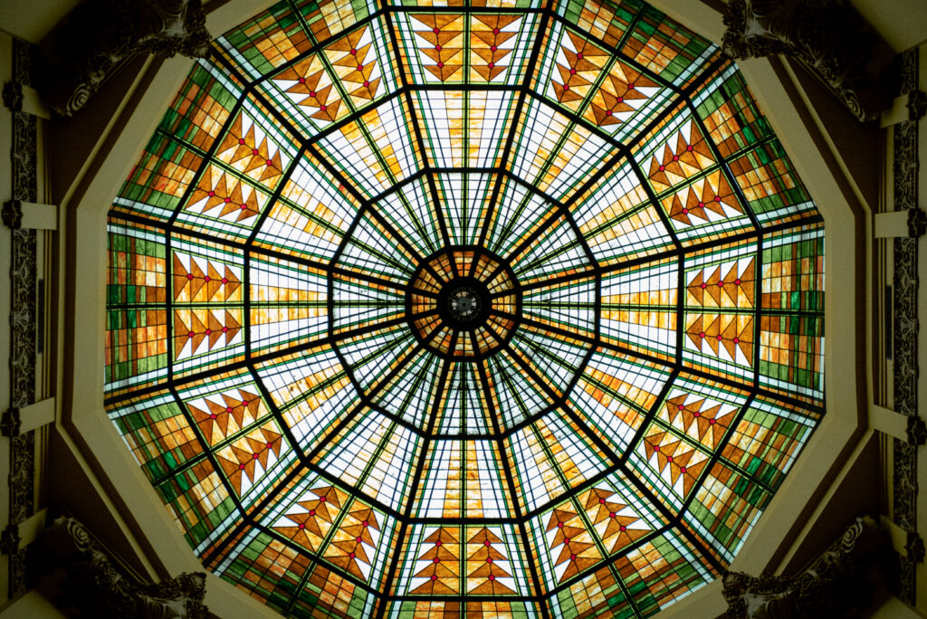 Stunning stained-glass dome inside the historic 1910 courthouse in Houston, Texas.