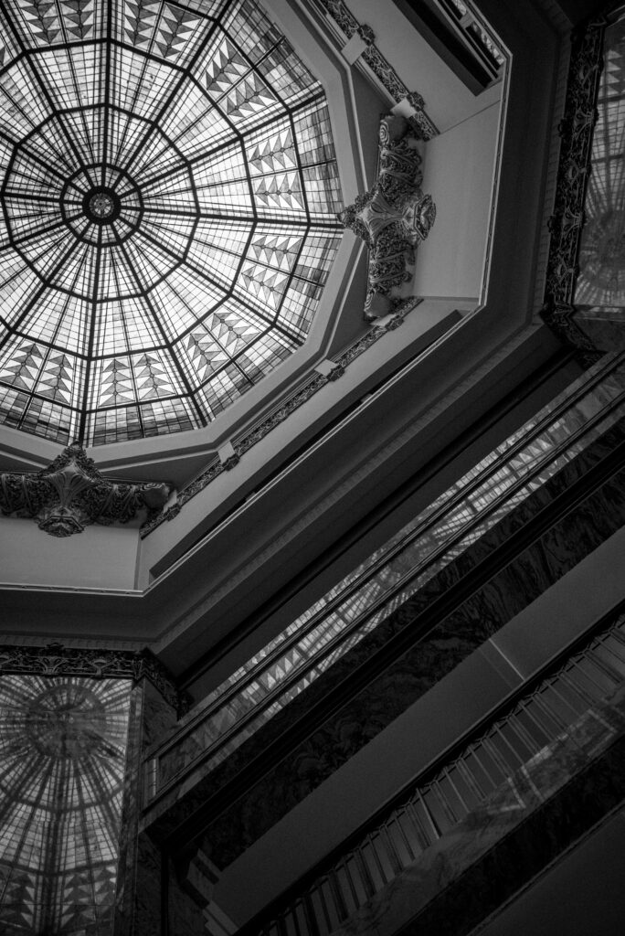 Architectural detail of the stained-glass ceiling inside Houston’s historic 1910 courthouse