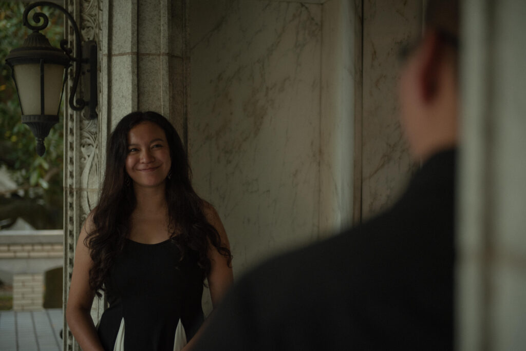 A candid moment of a woman smiling warmly at her partner.