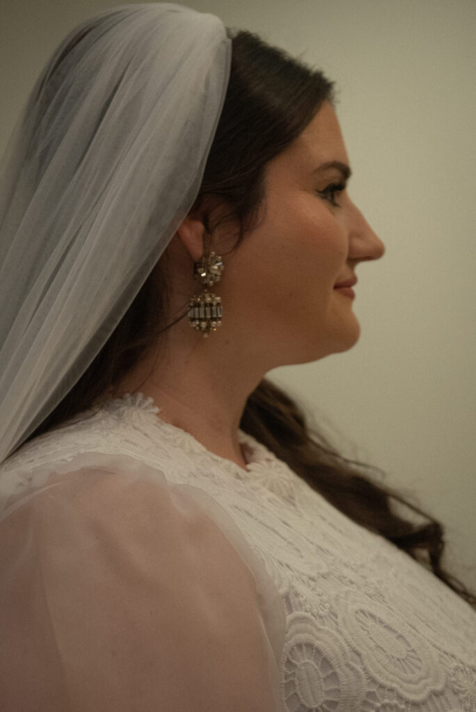 Indoor bridal portrait captured during a Texas Hill Country elopement, featuring soft light and timeless details.