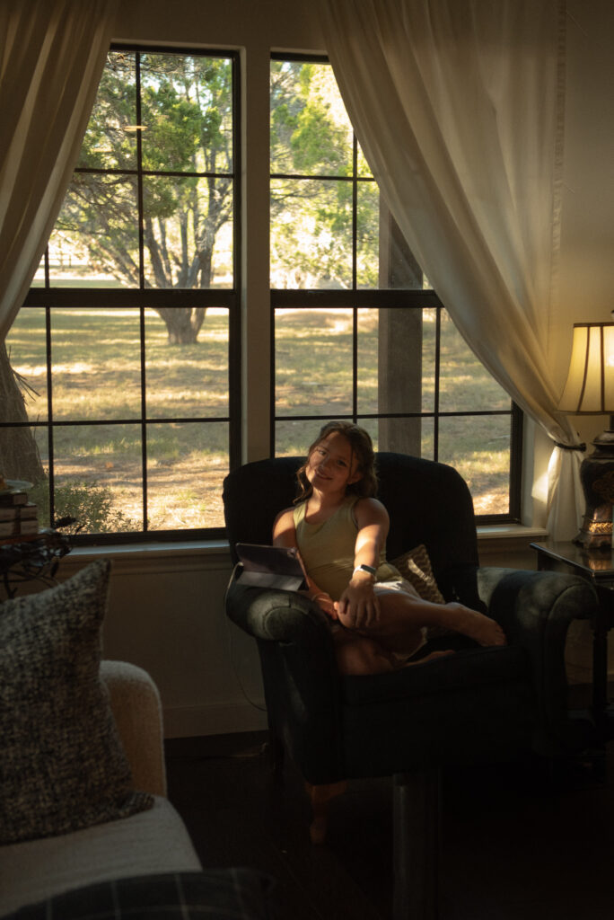 Candid family moment during an intimate elopement day inside a Wimberley, Texas Hill Country home.