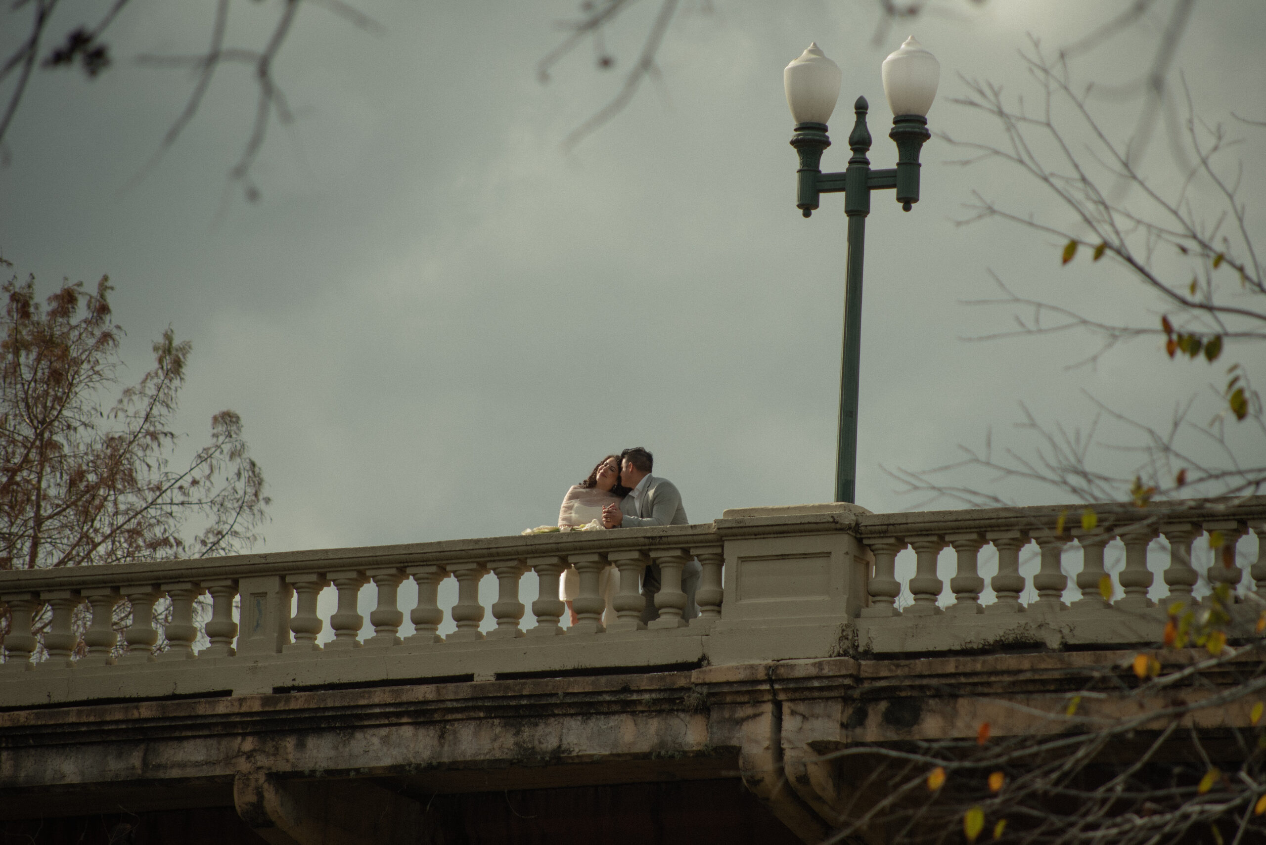 Couple portraits after a Houston courthouse elopement on a bridge near Buffalo Bayou in downtown Houston.