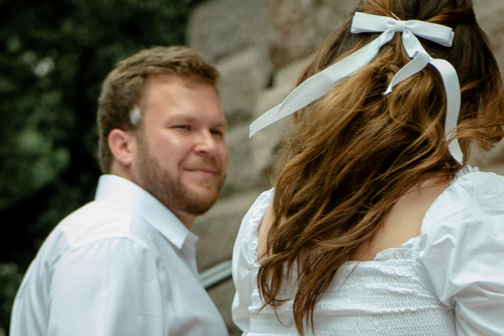 A couple walking up the steps of the 1910 Houston Courthouse during their elopement session.