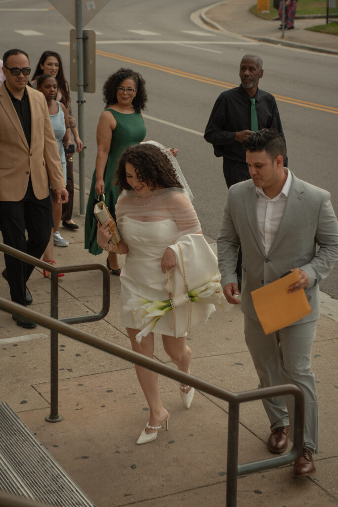 Family arriving for a Houston municipal courthouse elopement ceremony in downtown Houston.