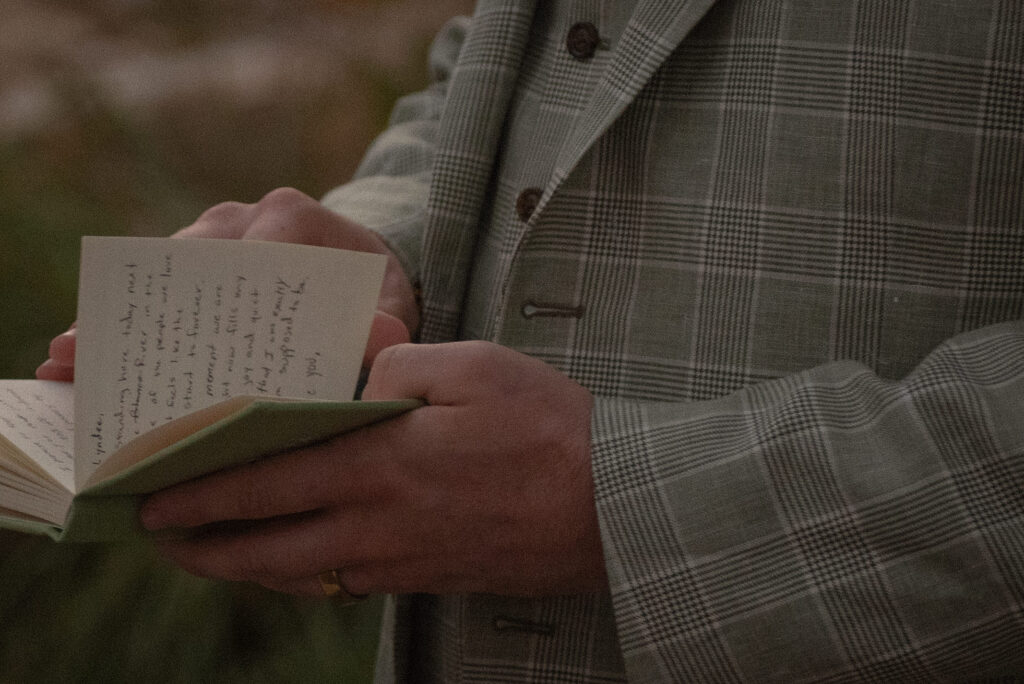 Close up of handwritten vows during an outdoor elopement in the Texas Hill Country